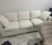 2 very comfortable, creme colour sofas with integr..