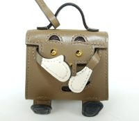 Hermès Kelly Doll Bag Charm – Iconic & Playful Lux..