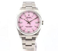 Rolex Oyster Perpetual 36 – Pink Dial
Reference: 1..