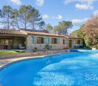 Charming single-story villa with pool.