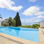 Charming apartment with pool and sea views – Featured