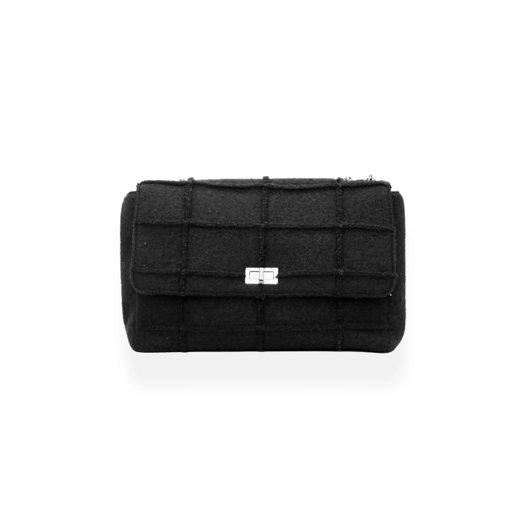 Chanel 2.55 Flap Bag – Black Wool Jumbo

Reference..