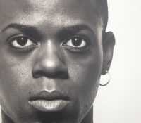 MICHEL COMTE

“Black man – hoop earrings – full fa..