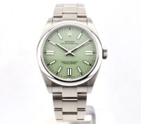 Rolex Oyster Perpetual 41mm – Pistachio Dial

Refe..