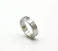 CARTIER LOVE RING – WHITE GOLD WITH 3 BRILLIANTS

..