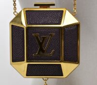 LOUIS VUITTON MINAUDIÈRE IN BORDEAUX AND GOLD META..