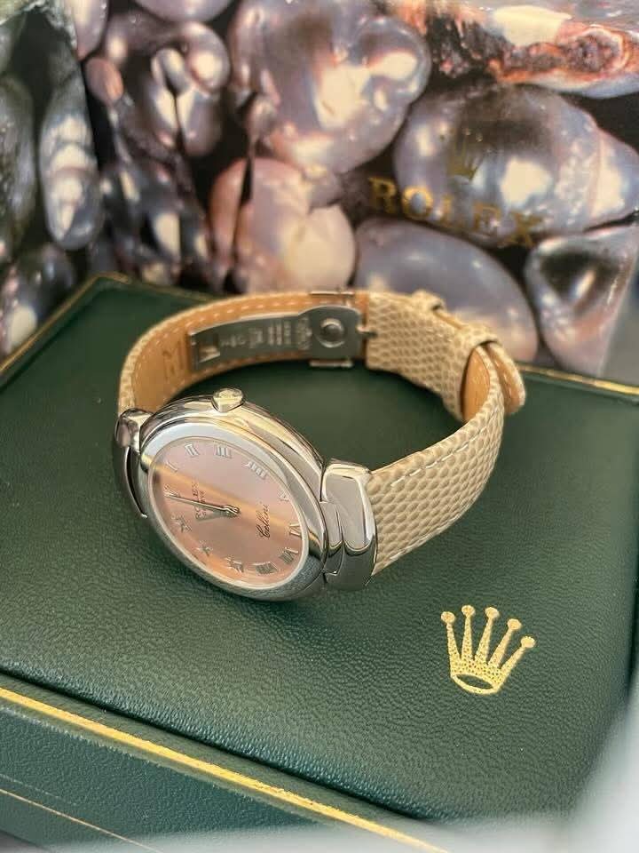 Rolex Cellini White Gold 6622 Pink Roman Dial

Ref..