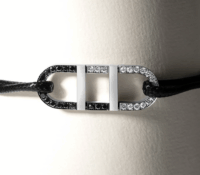EXPLORER BI-COLOR BRACELET IN BLACK AND WHITE DIAM..