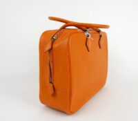 HERMÈS PLUME HANDBAG IN ORANGE LEATHER

Price: €5,..