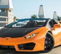 LAMBORGHINI HURACAN ORANGE WITH BLACK HOOD RENTAL
..