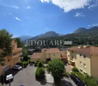 Ideally located in Menton, two bedroom apartment with large terrace and garage, sole agency